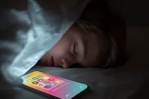 Why keep your phone away kid sleeping next to phone